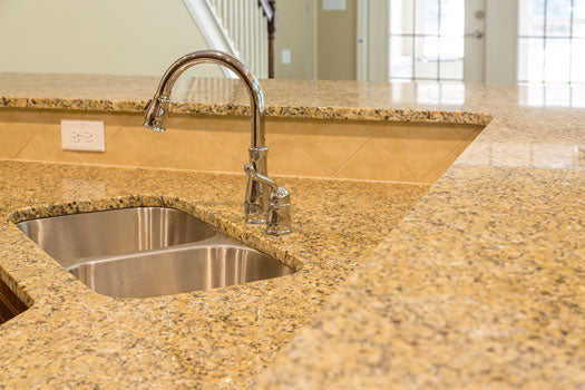 How to prevent cloudy film on granite countertop