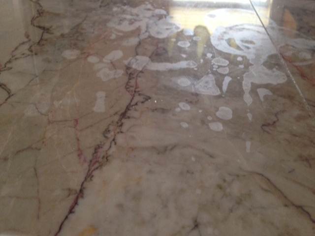 Alcohol, ammoniac or bleach stains on Natural stone. What to do?