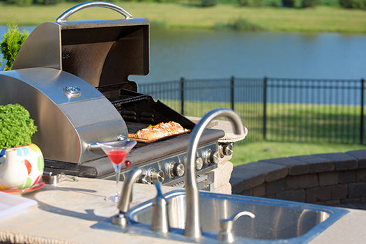 An image of a grill and how to care for natural stone outdoors.